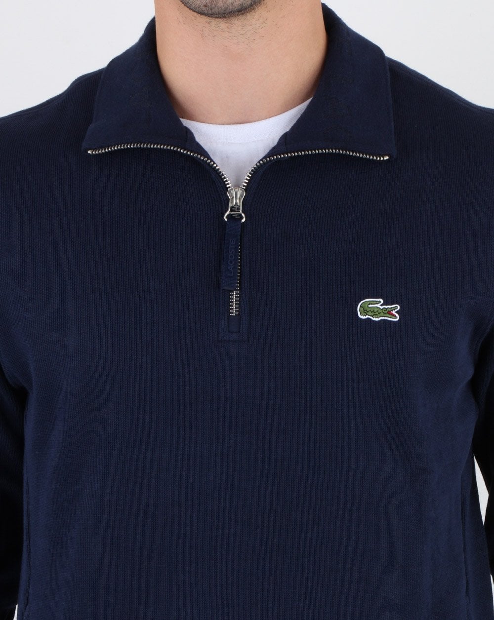 Lacoste – Oberteil mit Viertelreißverschluss in Marineblau