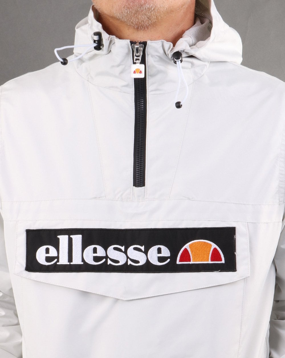 Ellesse – Jacke mit Viertelreißverschluss, Hellgrau