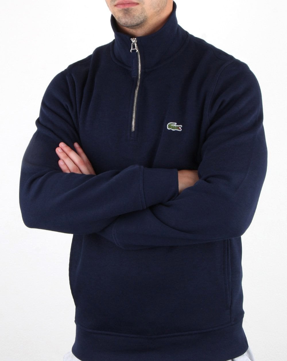 Lacoste – Oberteil mit Viertelreißverschluss in Marineblau