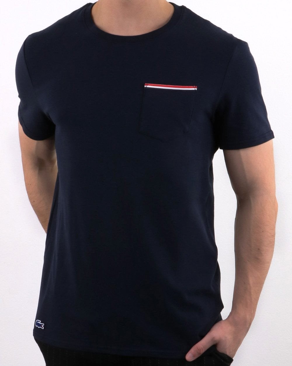Lacoste – Gestreiftes T-Shirt mit Tasche in Marineblau