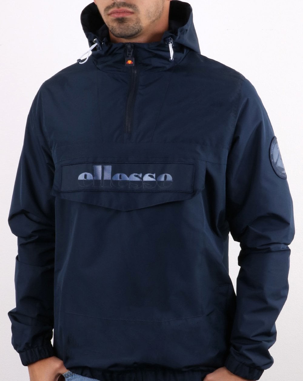 Ellesse – Reflektierende Jacke mit Viertelreißverschluss in Marineblau