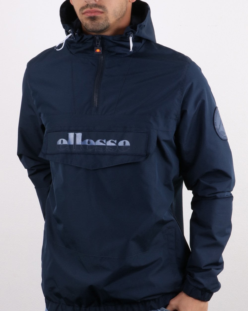 Ellesse – Reflektierende Jacke mit Viertelreißverschluss in Marineblau