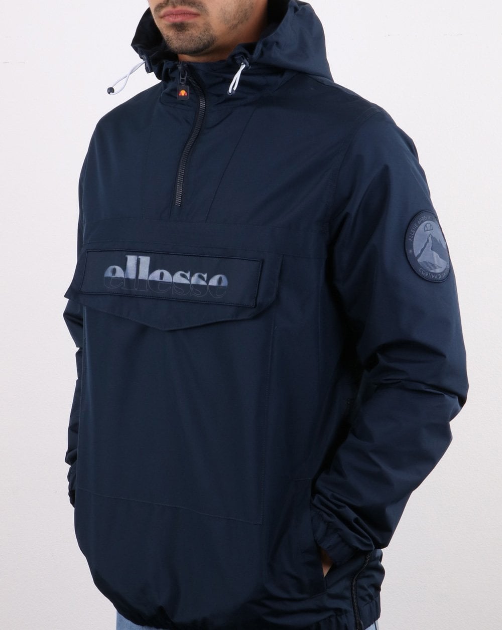 Ellesse – Reflektierende Jacke mit Viertelreißverschluss in Marineblau
