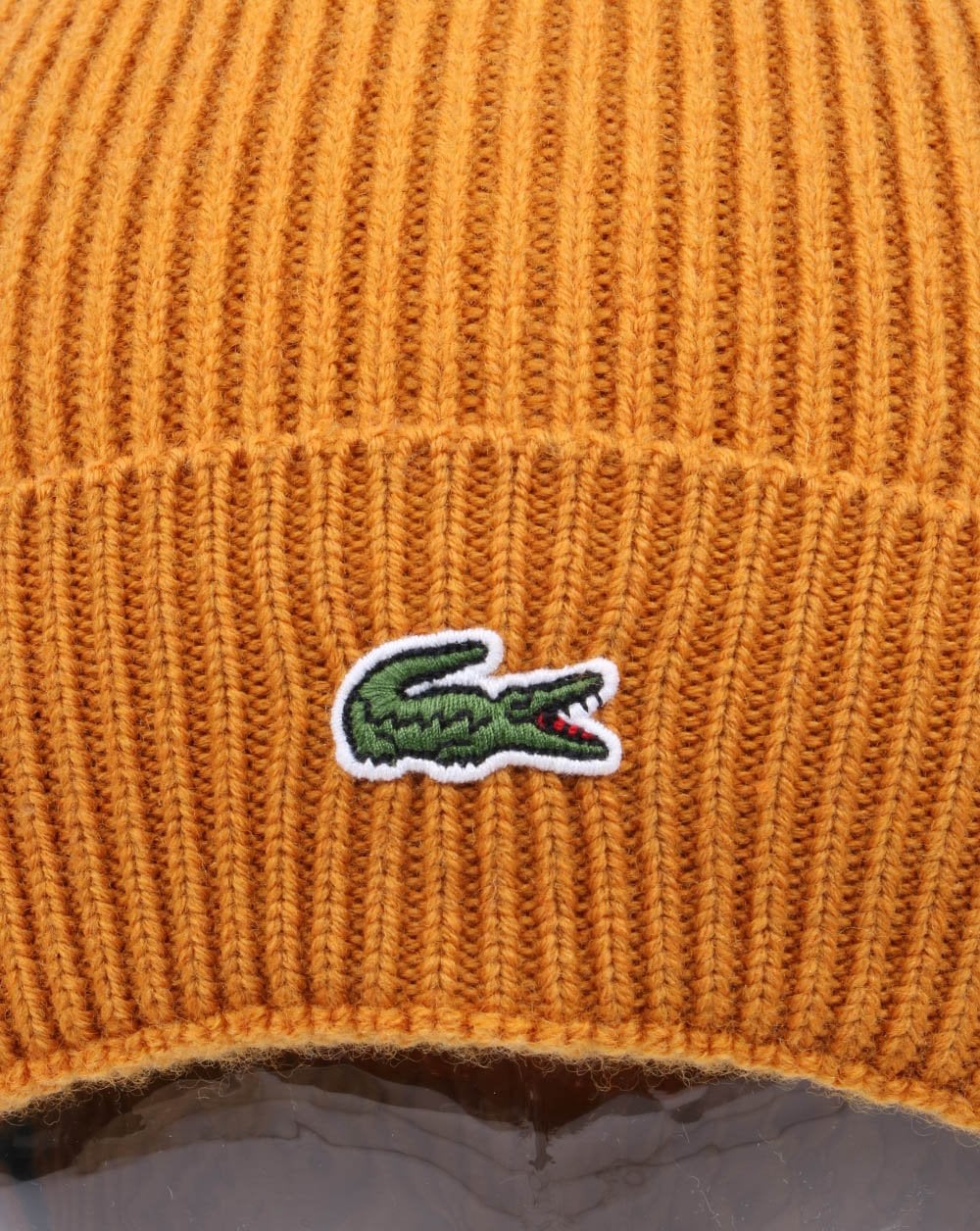 Lacoste – Gerippte Wollmütze mit Umschlag in Senfgelb