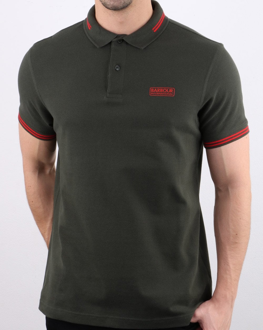 Barbour International Poloshirt mit Streifen in Dschungelgrün