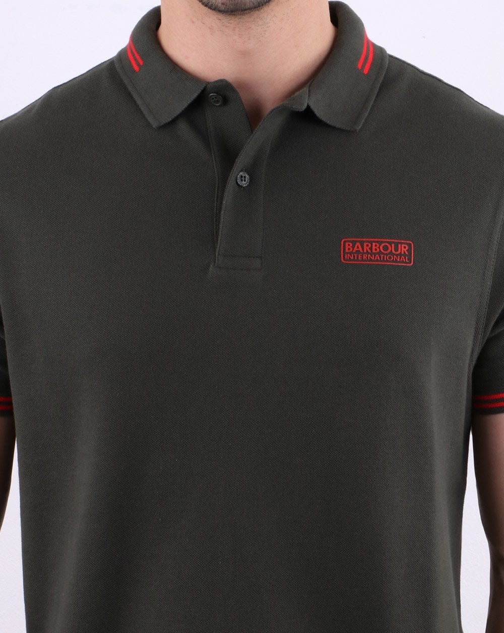 Barbour International Poloshirt mit Streifen in Dschungelgrün