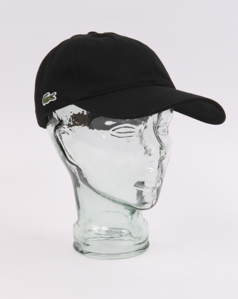 Lacoste – Baumwollkappe mit Kontrastriemen in Schwarz