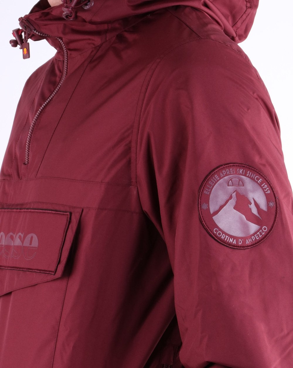 Ellesse – Jacke mit Viertelreißverschluss in Burgunderrot