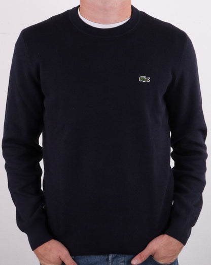 Lacoste – Rundhalspullover aus Baumwollpiqué in Marineblau