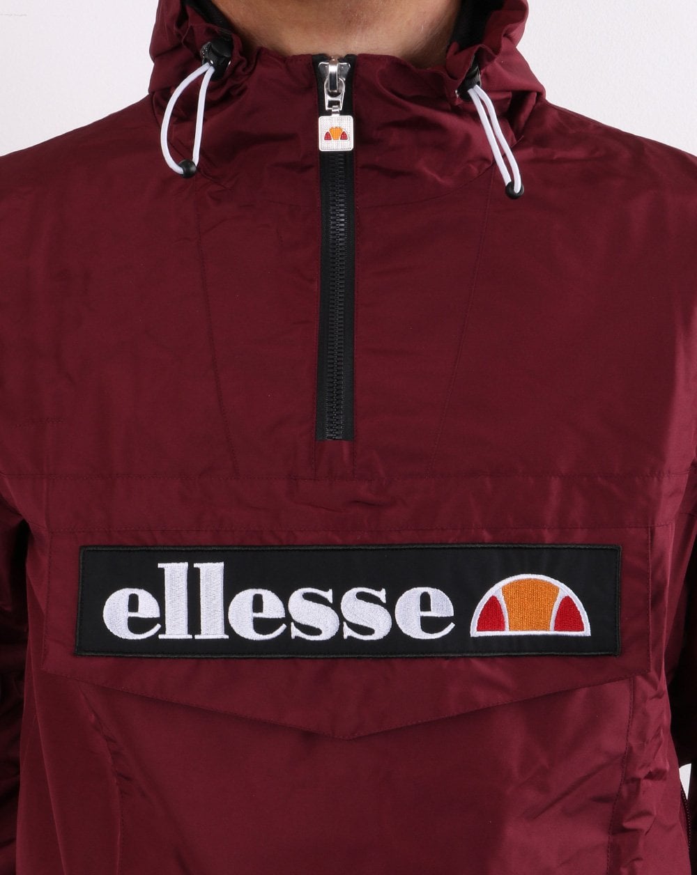 Ellesse – Jacke mit Viertelreißverschluss in Burgunderrot