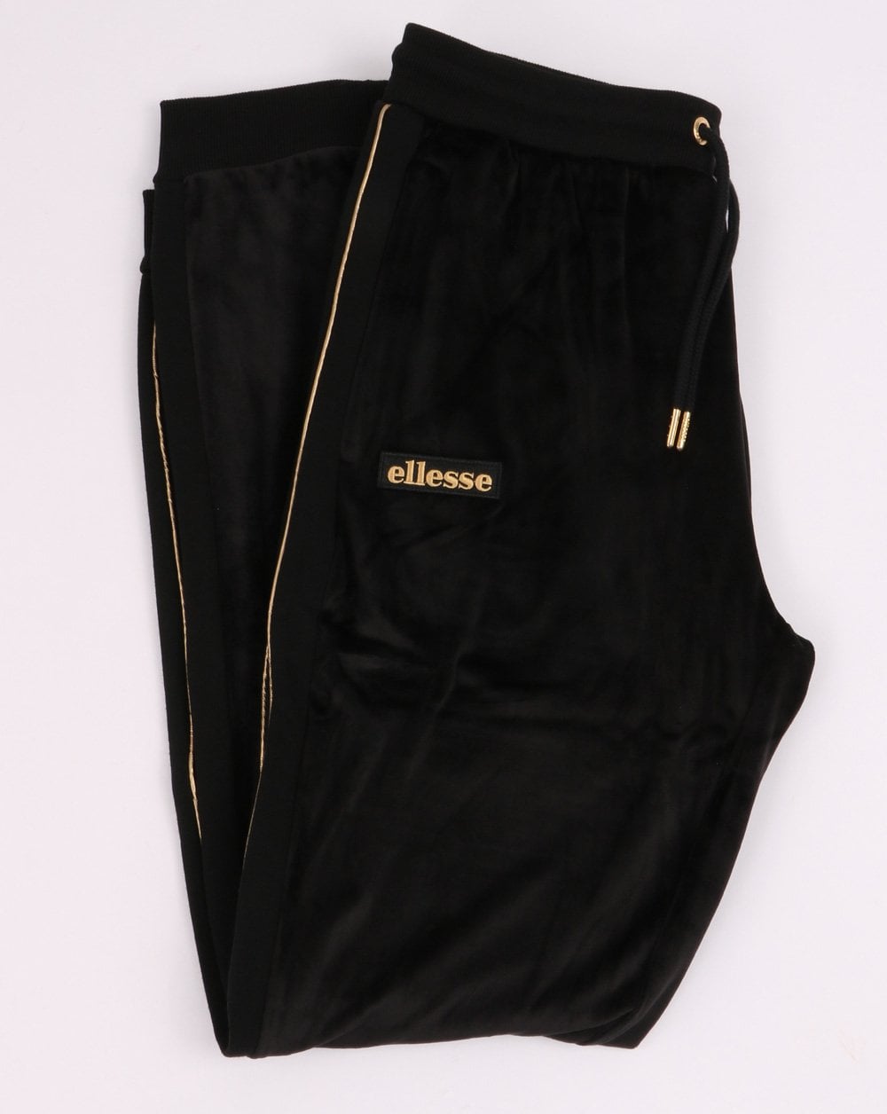 Ellesse – Velours-Trainingshose in Schwarz