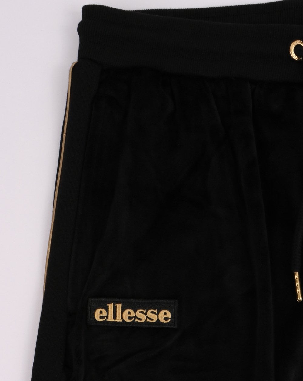 Ellesse – Velours-Trainingshose in Schwarz
