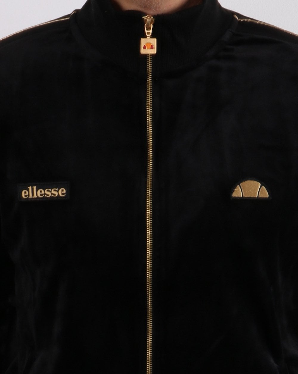 Ellesse – Velours-Trainingsoberteil in Schwarz