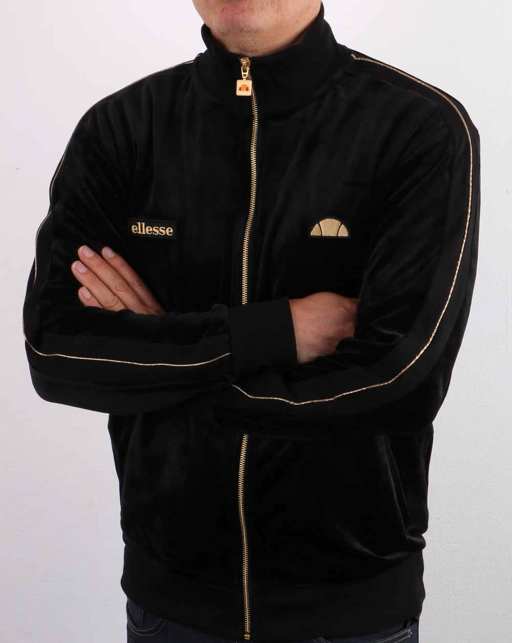 Ellesse – Velours-Trainingsoberteil in Schwarz