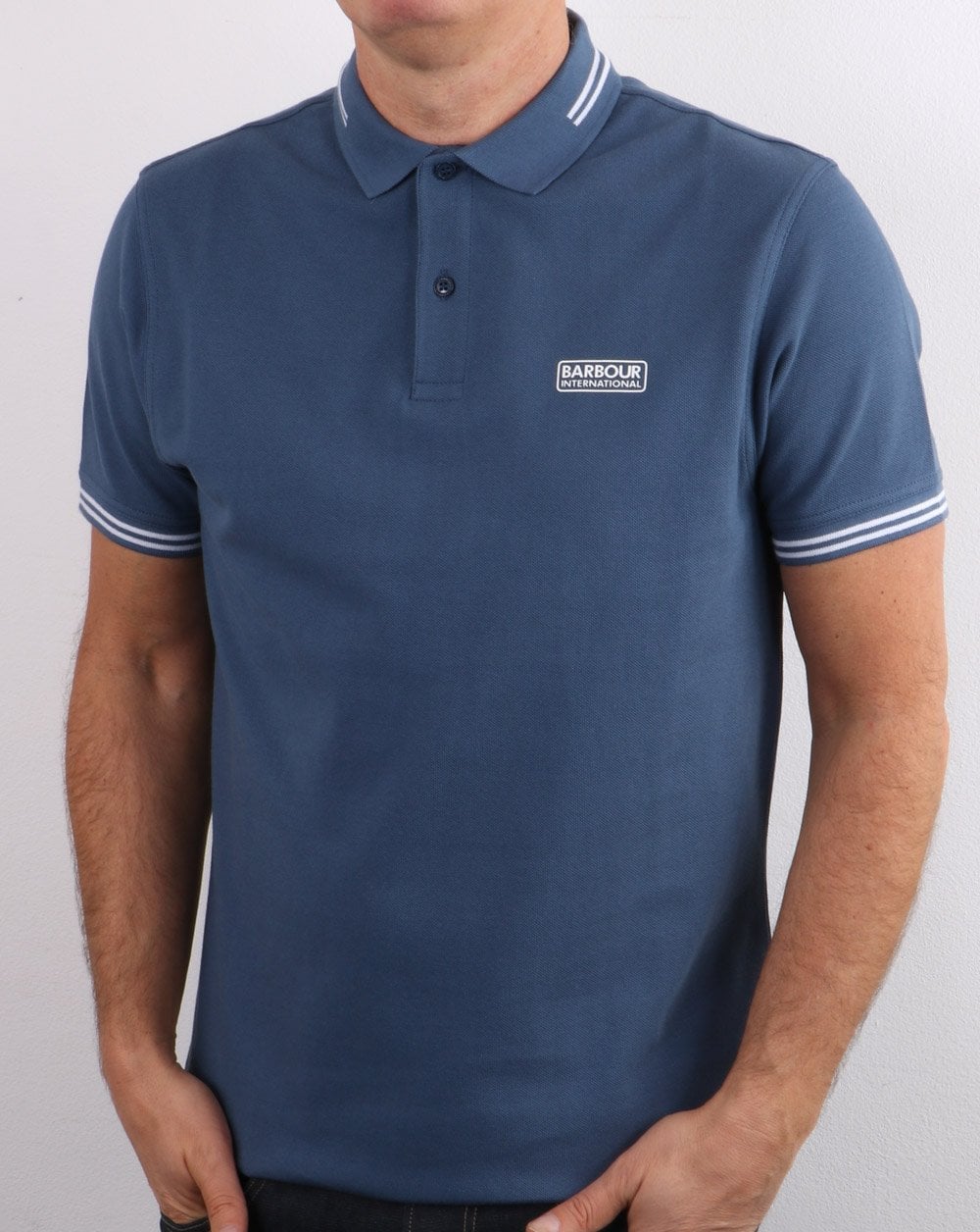 Barbour International Poloshirt mit Streifen in Mittelblau