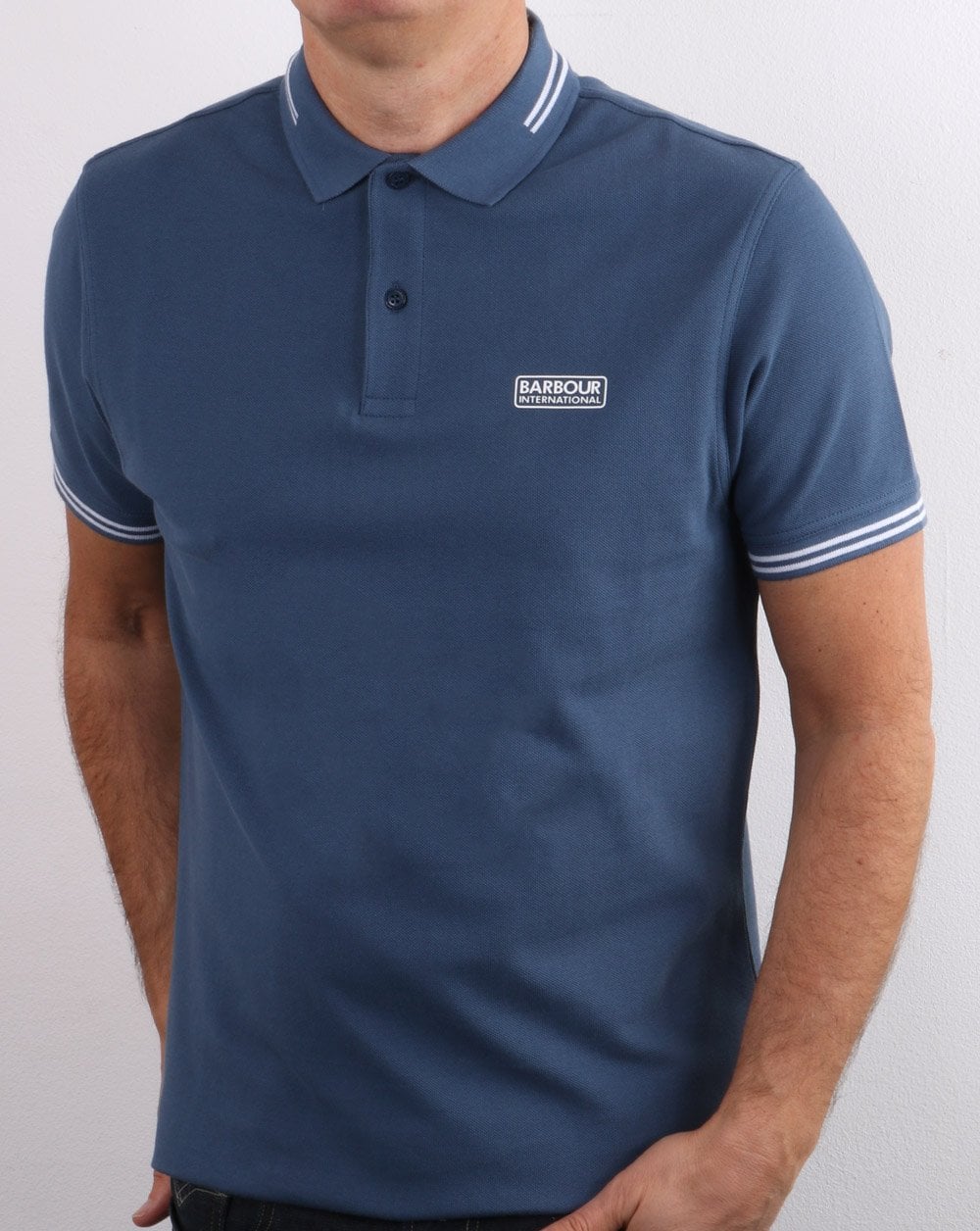 Barbour International Poloshirt mit Streifen in Mittelblau