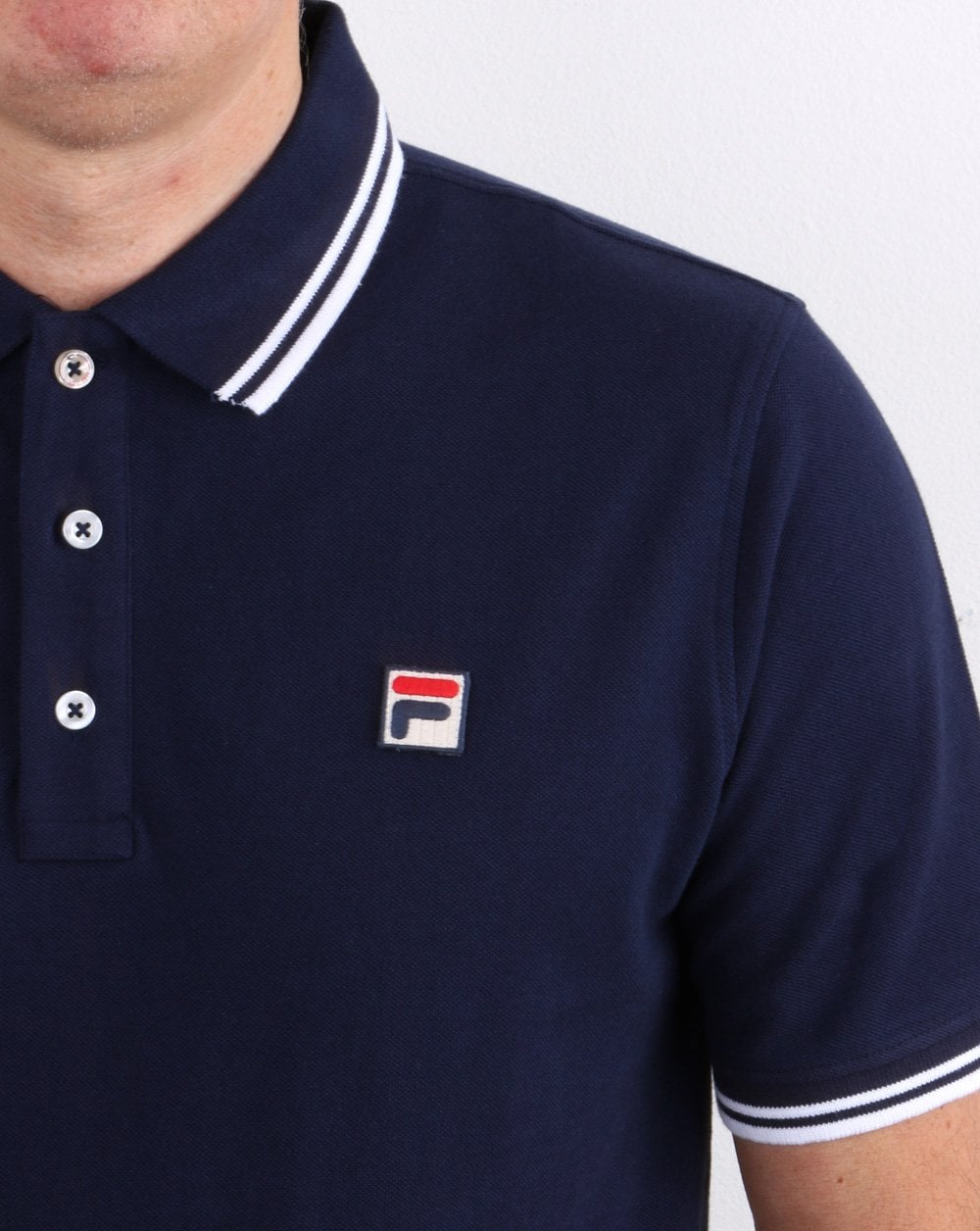 Fila – Poloshirt mit Vintage-Streifen und Marineblau