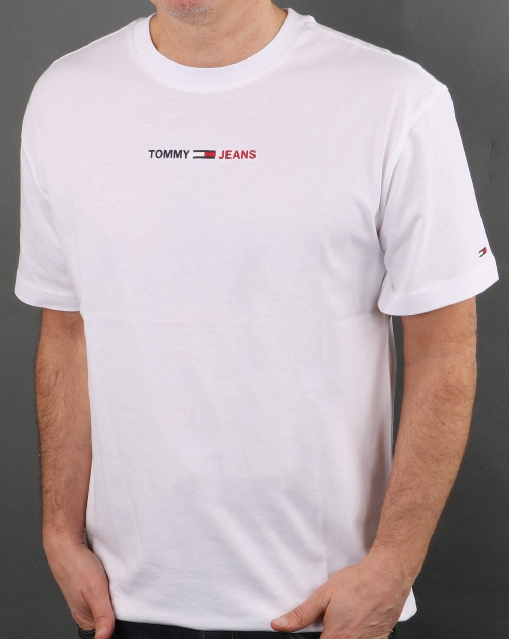 Tommy Jeans – Weißes T-Shirt mit linearem Logo