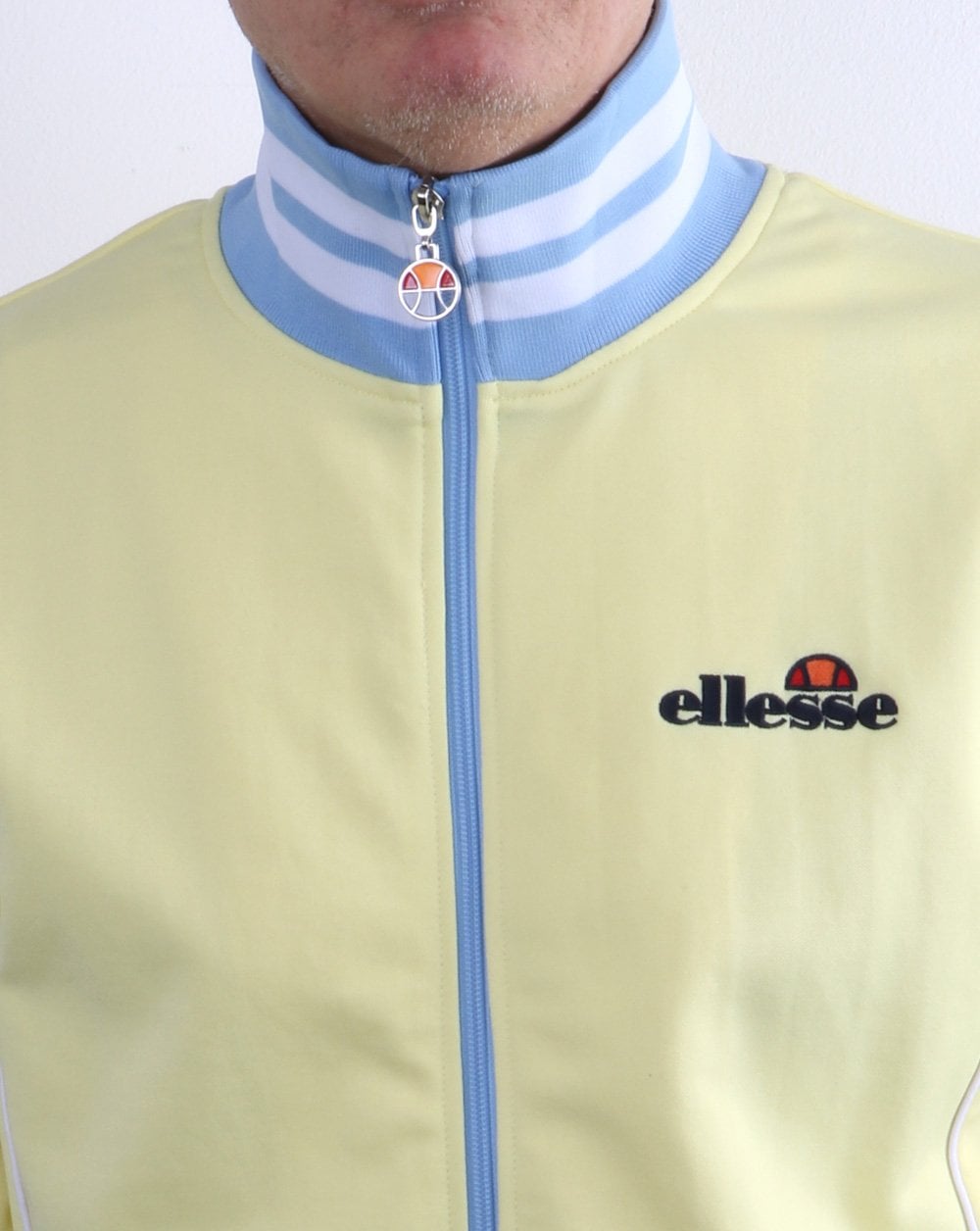 Ellesse – Milano Trainingsjacke, Hellgelb/Himmelblau