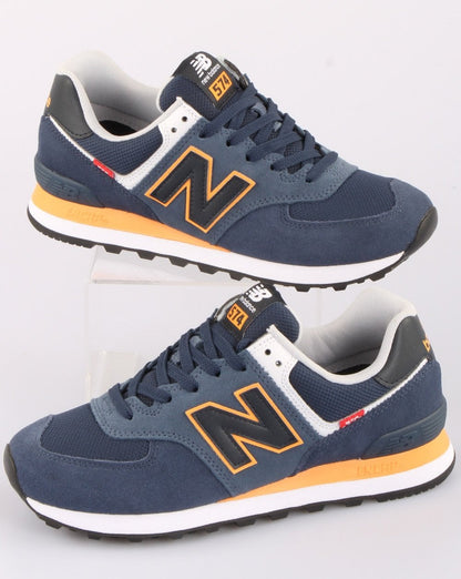 New Balance 574 Trainer Marineblau/Orange