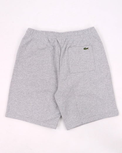 Lacoste – Shorts mit Krokodilmuster in Silber