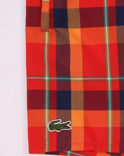 Lacoste – Badeshorts mit Karomuster, Rot/Orange