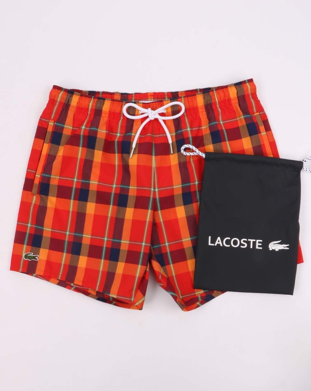 Lacoste – Badeshorts mit Karomuster, Rot/Orange