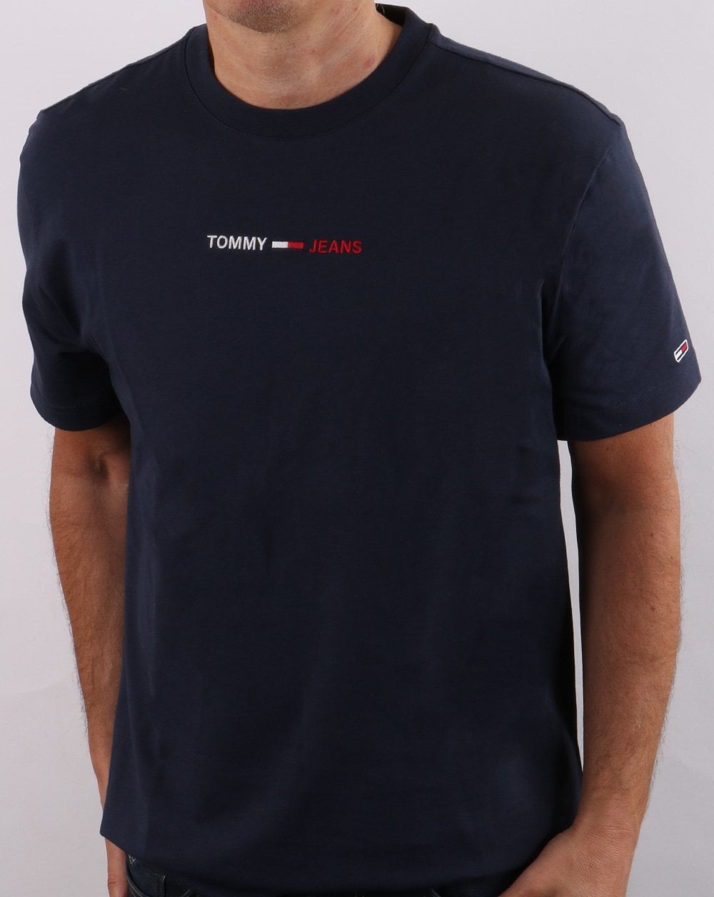 Tommy Jeans – T-Shirt mit linearem Logo in Marineblau
