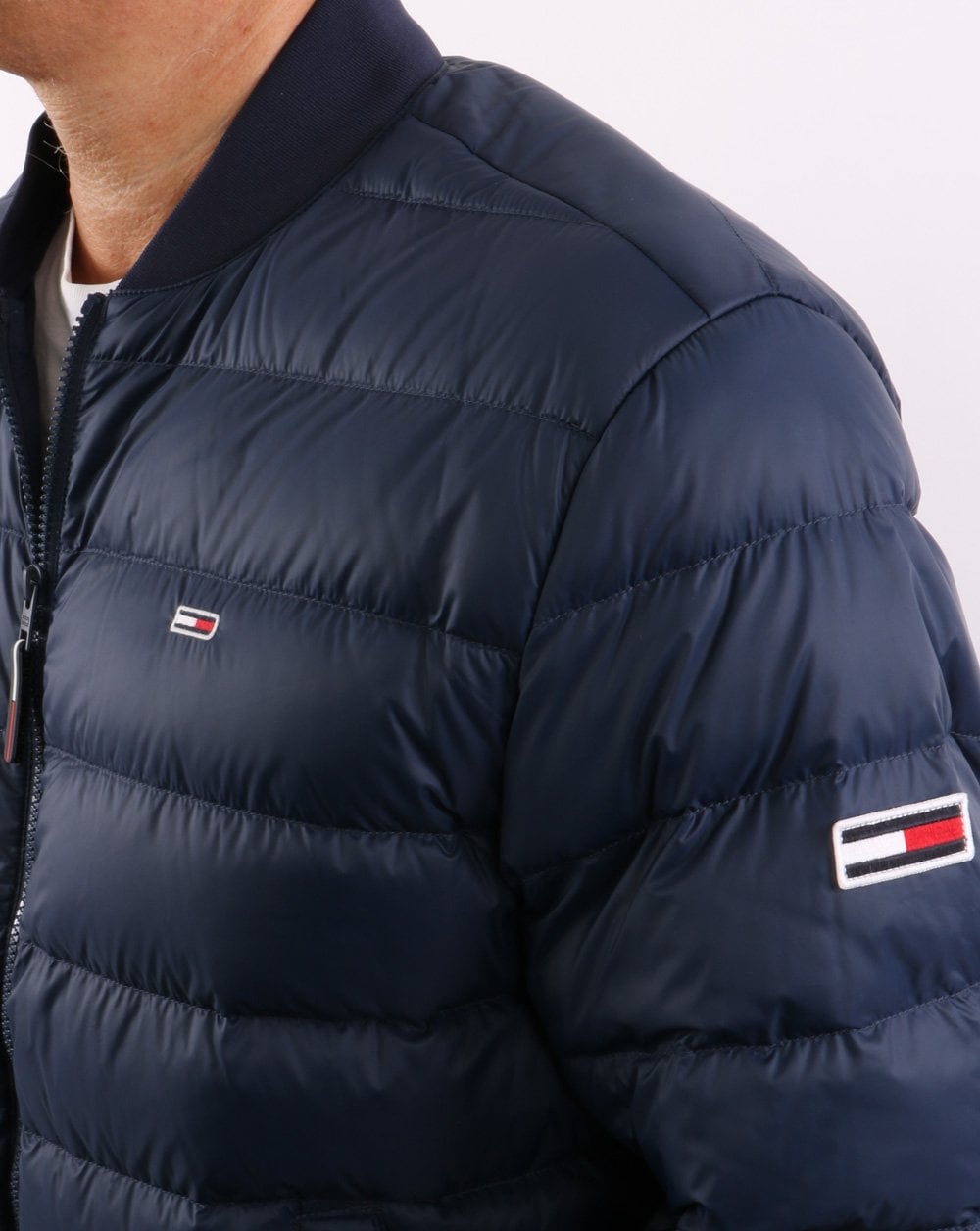 Tommy Jeans – Daunen-Bomberjacke in Marineblau