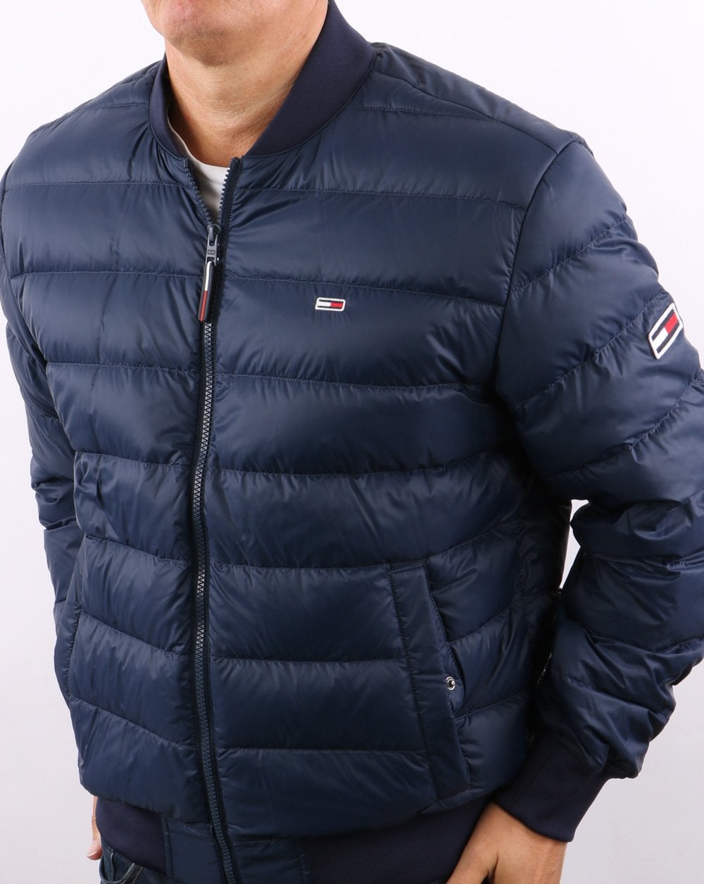 Tommy Jeans – Daunen-Bomberjacke in Marineblau