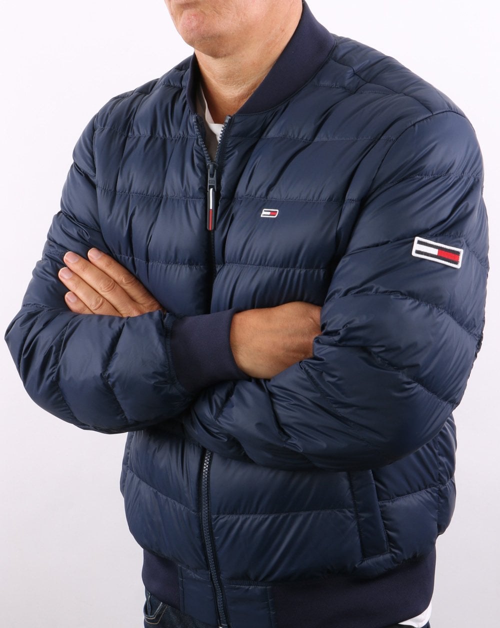 Tommy Jeans – Daunen-Bomberjacke in Marineblau