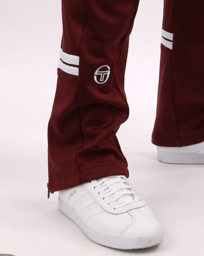Sergio Tacchini – Trainingshose mit Reißverschluss in Burgunderrot