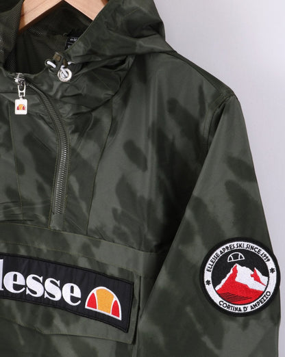 Ellesse – Jacke mit Viertelreißverschluss in Dunkelgrün mit Batikmuster
