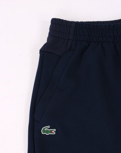 Lacoste Sport – Shorts mit Mesh-Einsatz in Marineblau