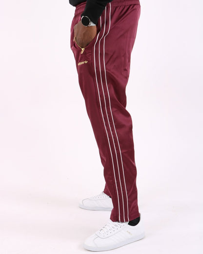 Adidas Originals – Firebird – Satin-Trainingshose in Victory Crimson
