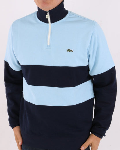 Lacoste – Pullover mit Reißverschluss und Farbblockdesign, Himmelblau/Marineblau