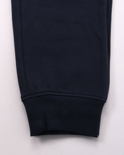 Tommy Jeans – Schmale Fleece-Trainingshose in Twilight Navy