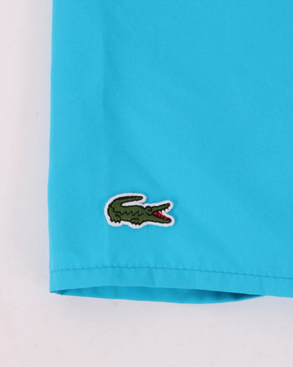 Lacoste Badeshorts Türkis/Marineblau