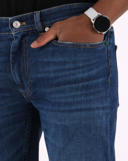 Lacoste – Slim-Fit-Jeans in verwaschenem Dunkelblau (Medium)