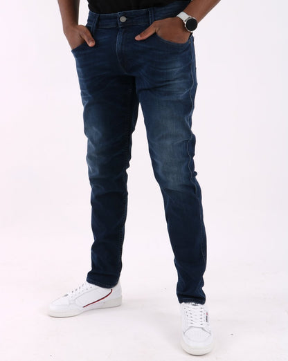 Replay – Anbass – Slim Fit Jeans in Dunkelblau