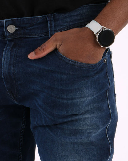 Replay – Anbass – Slim Fit Jeans in Dunkelblau