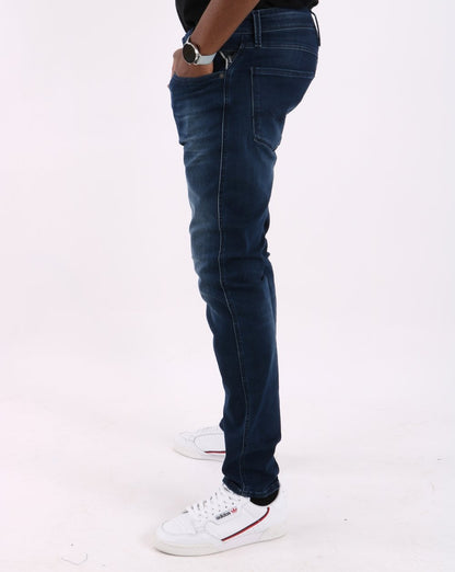 Replay – Anbass – Slim Fit Jeans in Dunkelblau