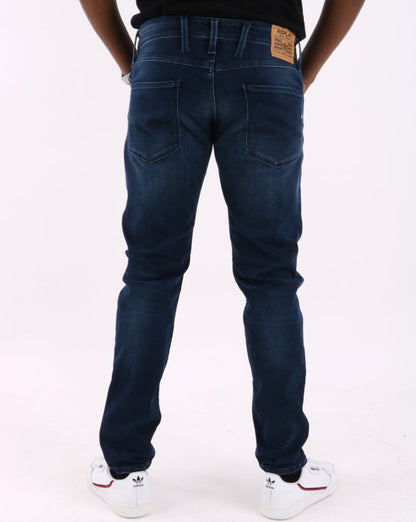 Replay – Anbass – Slim Fit Jeans in Dunkelblau