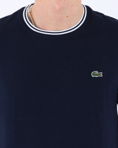 Lacoste – Gestreiftes T-Shirt mit Rundhalsausschnitt in Marineblau