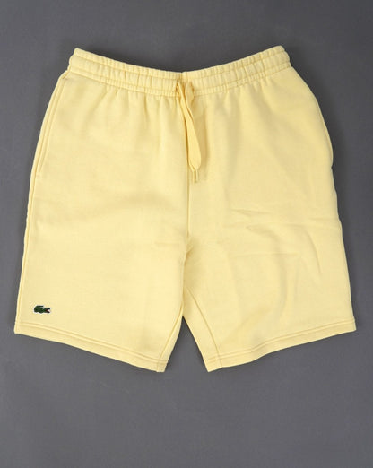 Lacoste – Fleece-Shorts mit Gesäßtasche, Gelb