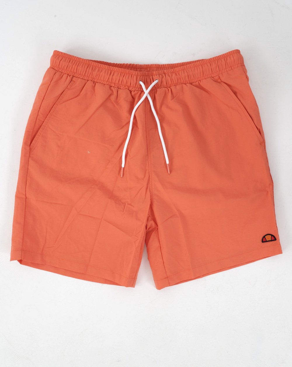 Ellesse – Manti – Badeshorts in Koralle