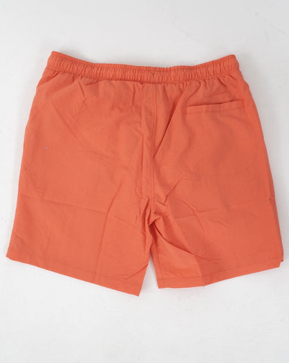Ellesse – Manti – Badeshorts in Koralle