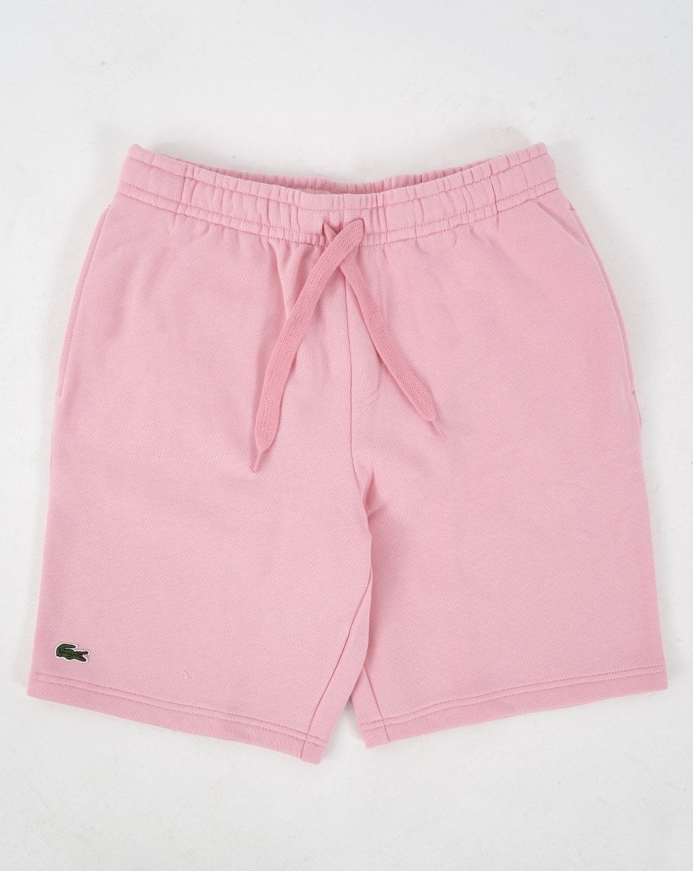 Lacoste – Fleece-Shorts mit Gesäßtasche in Rosa