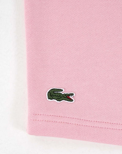 Lacoste – Fleece-Shorts mit Gesäßtasche in Rosa