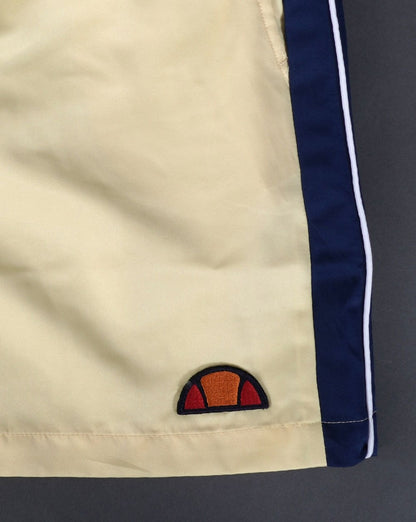 Ellesse – Genoa – Badeshorts in Gelb